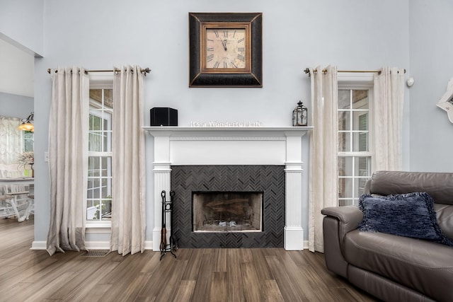 116 Macy Ct, Christiana, TN 37037 - living area featuring wood finished floors and a tile fireplace