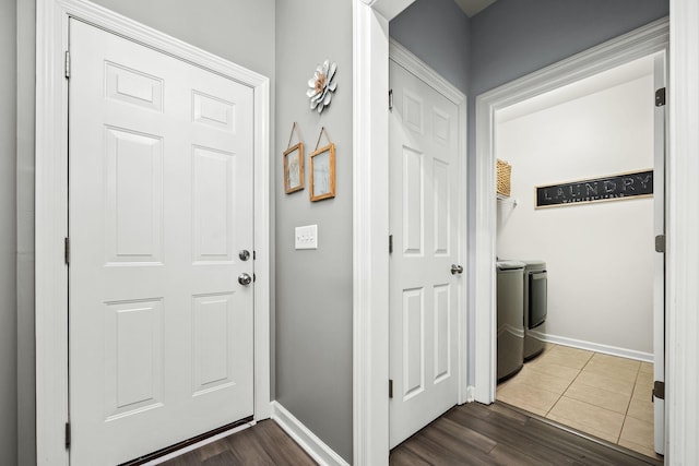 116 Macy Ct, Christiana, TN 37037 - foyer entrance featuring independent washer and dryer, baseboards, and dark wood finished floors