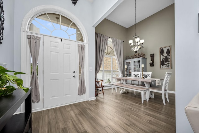 116 Macy Ct, Christiana, TN 37037 - entryway with wood finished floors, a chandelier, baseboards, and a high ceiling