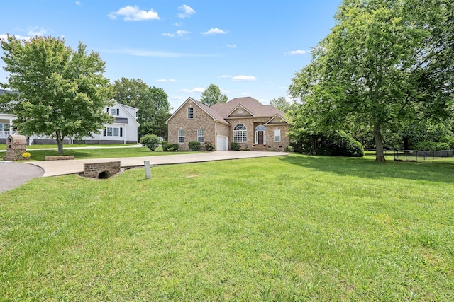 116 Macy Ct, Christiana, TN 37037 - view of front of house with a front yard, brick siding, driveway, and a garage