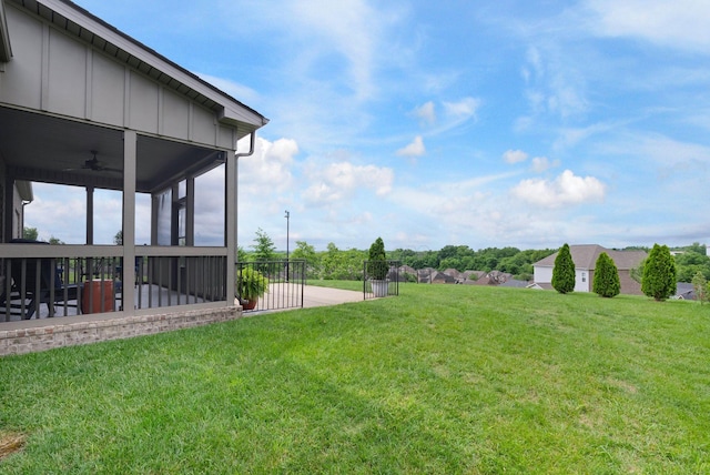 140 Split Rail Ln, Spring Hill, TN 37174 - view of grassy yard featuring ceiling fan, a sunroom, and a patio area