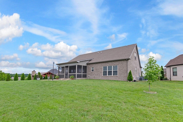 140 Split Rail Ln, Spring Hill, TN 37174 - back of house with a sunroom, a yard, and cooling unit