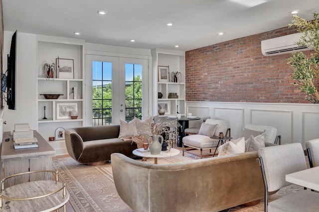 603 51st Ave, Nashville, TN 37209 - living area with an AC wall unit, brick wall, recessed lighting, wainscoting, and a decorative wall