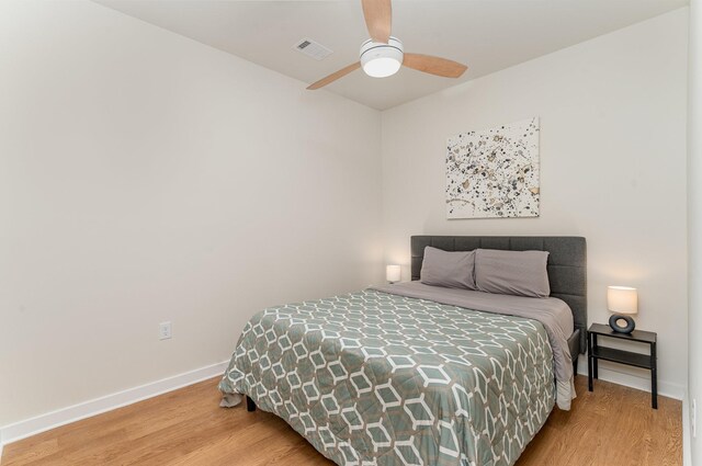 600 E Trinity Ln Unit 20, Nashville, TN 37207 - bedroom with wood finished floors, baseboards, and a ceiling fan