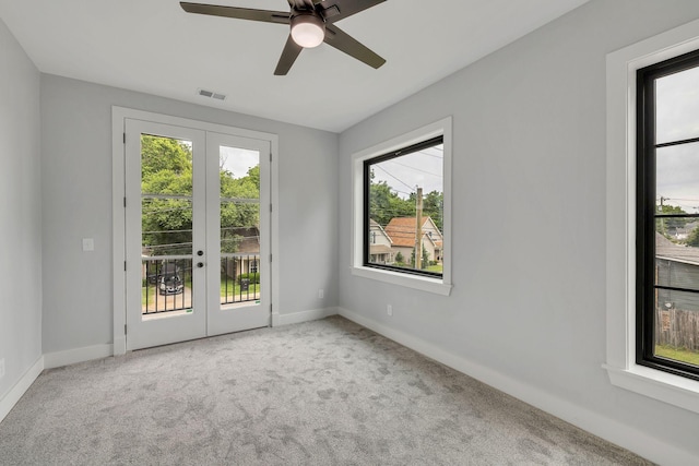 415 S University St, Murfreesboro, TN 37130 - carpeted spare room with healthy amount of natural light, a ceiling fan, baseboards, and french doors