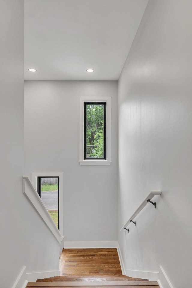 415 S University St, Murfreesboro, TN 37130 - stairway featuring wood finished floors, baseboards, and recessed lighting