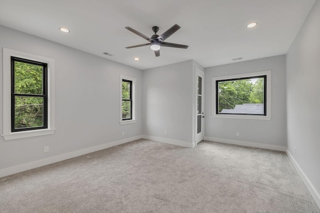 415 S University St, Murfreesboro, TN 37130 - spare room featuring light colored carpet, recessed lighting, baseboards, and ceiling fan