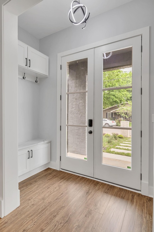 415 S University St, Murfreesboro, TN 37130 - entryway featuring french doors, a chandelier, and light wood-style floors