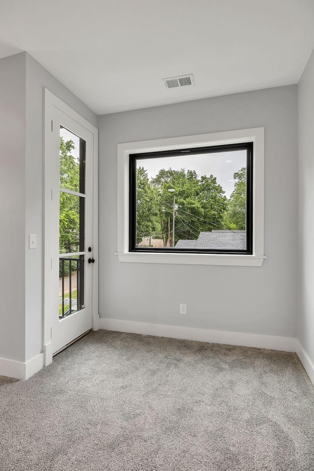 415 S University St, Murfreesboro, TN 37130 - carpeted spare room with healthy amount of natural light and baseboards