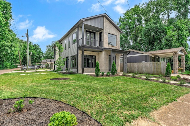 415 S University St, Murfreesboro, TN 37130 - view of front facade with a balcony and brick siding