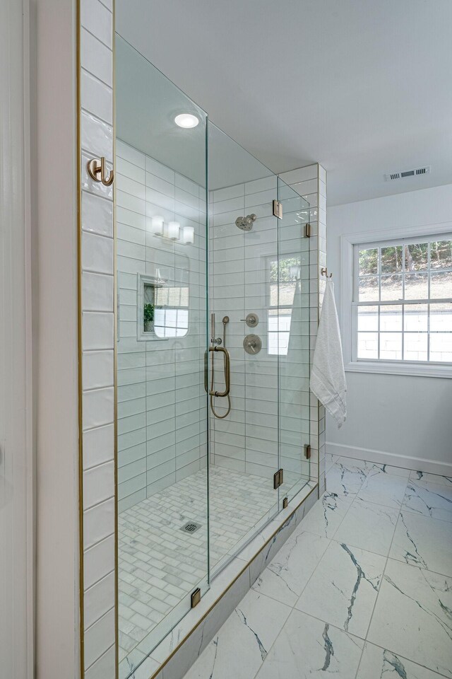 4626 Cato Rd, Nashville, TN 37218 - full bath featuring marble finish flooring, recessed lighting, a stall shower, and baseboards