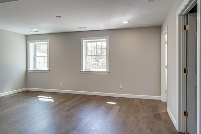 4626 Cato Rd, Nashville, TN 37218 - unfurnished room with plenty of natural light, baseboards, dark wood-style flooring, and recessed lighting