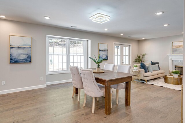 4626 Cato Rd, Nashville, TN 37218 - dining space featuring wood finished floors, recessed lighting, a premium fireplace, and baseboards