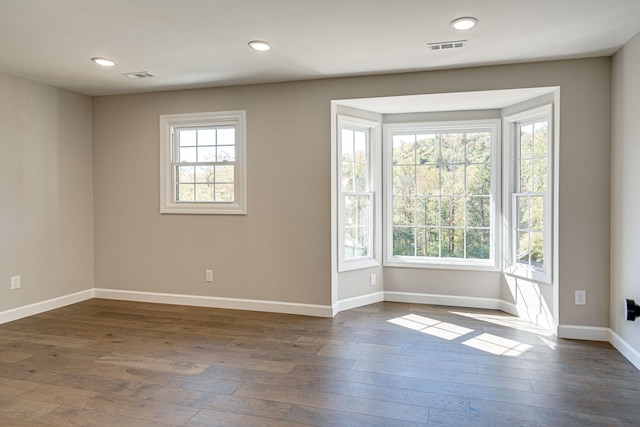 4626 Cato Rd, Nashville, TN 37218 - spare room featuring dark wood-style floors, baseboards, and recessed lighting