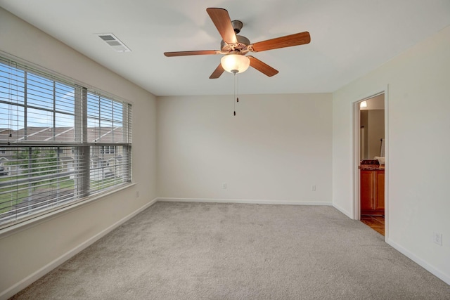 133 Cobblestone Place Dr, Goodlettsville, TN 37072 - empty room with carpet floors, a ceiling fan, and baseboards