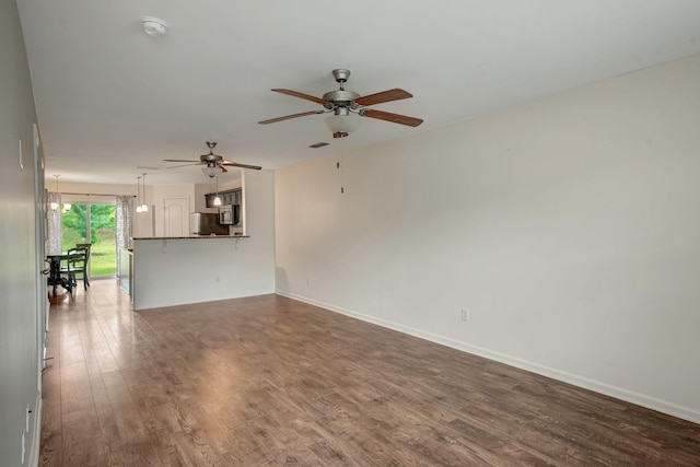 133 Cobblestone Place Dr, Goodlettsville, TN 37072 - unfurnished living room featuring ceiling fan, wood finished floors, and baseboards