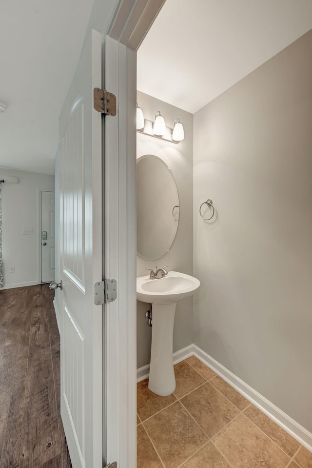 133 Cobblestone Place Dr, Goodlettsville, TN 37072 - bathroom with baseboards and tile patterned flooring