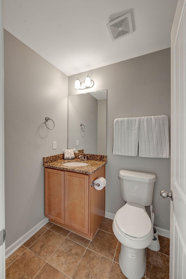 133 Cobblestone Place Dr, Goodlettsville, TN 37072 - half bathroom with toilet, baseboards, and vanity