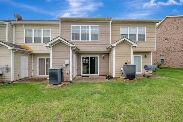133 Cobblestone Place Dr, Goodlettsville, TN 37072 - back of house featuring central AC unit and a lawn