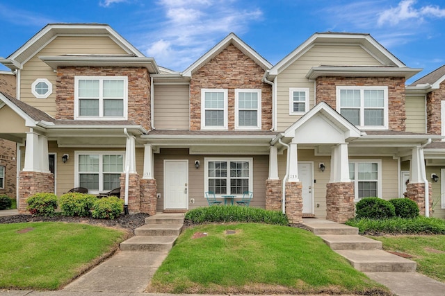 133 Cobblestone Place Dr, Goodlettsville, TN 37072 - view of front of house featuring a front yard, stone siding, and a porch