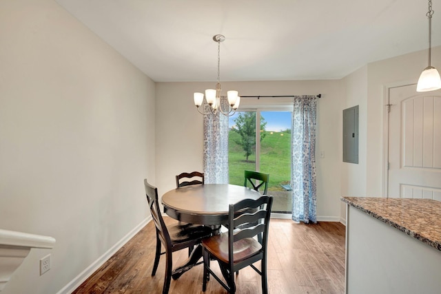 133 Cobblestone Place Dr, Goodlettsville, TN 37072 - dining space with electric panel, a chandelier, light wood finished floors, and baseboards
