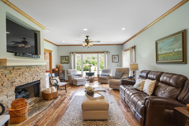 29 Roger Monk Rd, Petersburg, TN 37144 - living area with hardwood / wood-style floors, ceiling fan, recessed lighting, a stone fireplace, and ornamental molding