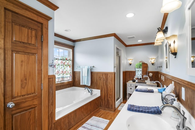 29 Roger Monk Rd, Petersburg, TN 37144 - bathroom with wainscoting, a stall shower, a bath, wood finished floors, and crown molding
