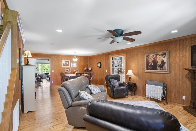 29 Roger Monk Rd, Petersburg, TN 37144 - living area featuring wood walls, ceiling fan, light wood-style flooring, recessed lighting, and crown molding