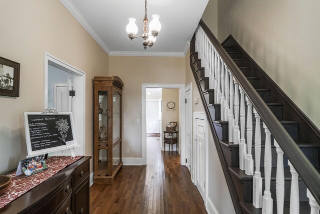 29 Roger Monk Rd, Petersburg, TN 37144 - entryway with crown molding, a chandelier, dark wood-type flooring, stairway, and baseboards