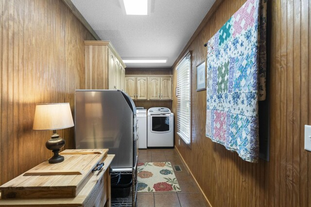 29 Roger Monk Rd, Petersburg, TN 37144 - washroom featuring washing machine and dryer, tile patterned floors, a textured ceiling, and wooden walls