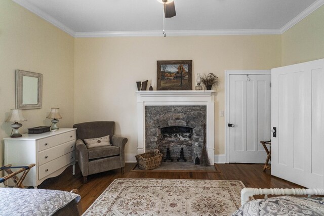 29 Roger Monk Rd, Petersburg, TN 37144 - bedroom with crown molding, dark wood-type flooring, a stone fireplace, a ceiling fan, and baseboards