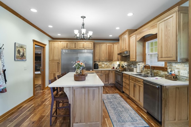 29 Roger Monk Rd, Petersburg, TN 37144 - kitchen with stainless steel appliances, a sink, under cabinet range hood, crown molding, and a chandelier