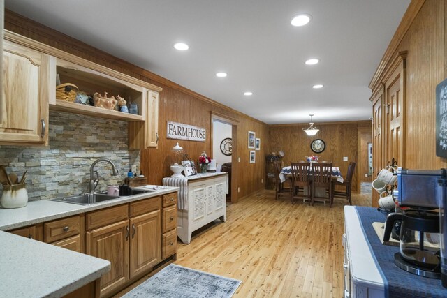 29 Roger Monk Rd, Petersburg, TN 37144 - kitchen with a sink, wooden walls, light wood-style flooring, recessed lighting, and decorative light fixtures