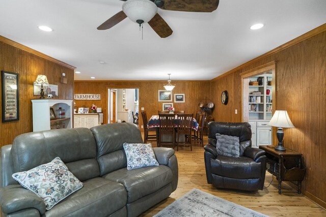29 Roger Monk Rd, Petersburg, TN 37144 - living room with wood walls, light wood-style floors, a ceiling fan, and recessed lighting