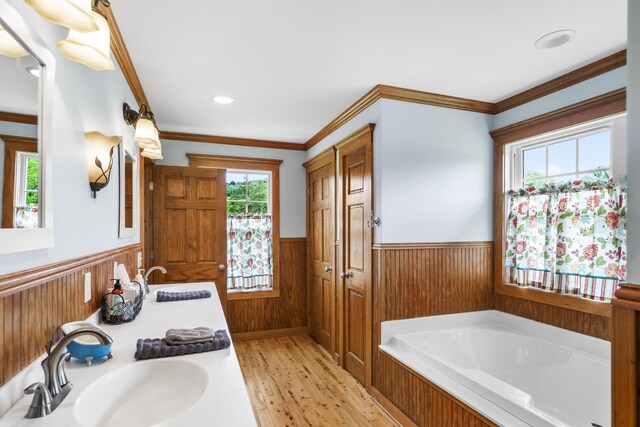 29 Roger Monk Rd, Petersburg, TN 37144 - full bath with a wainscoted wall, a garden tub, vanity, wood finished floors, and wooden walls