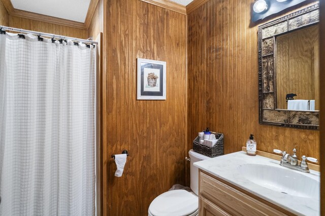 29 Roger Monk Rd, Petersburg, TN 37144 - bathroom featuring vanity, toilet, wood walls, a shower with shower curtain, and ornamental molding