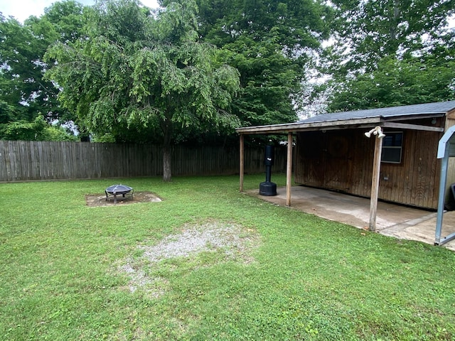 1818 Morningside Ave, Columbia, TN 38401 - view of yard with an outdoor fire pit, a carport, and a patio area