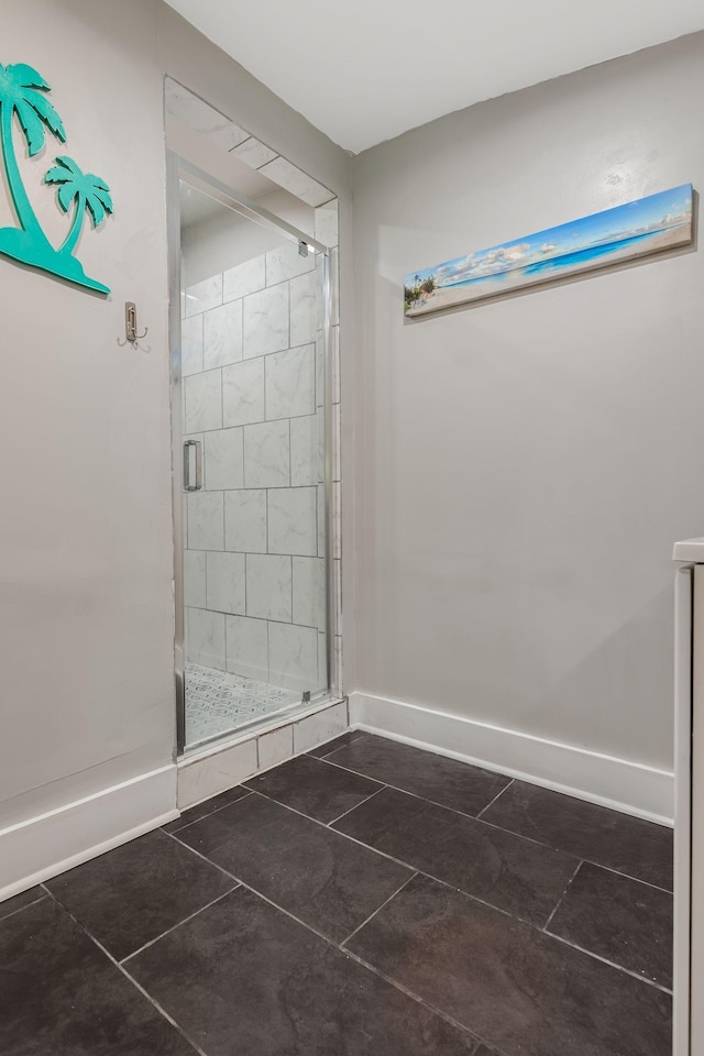 1818 Morningside Ave, Columbia, TN 38401 - bathroom with tile patterned floors, a stall shower, and baseboards