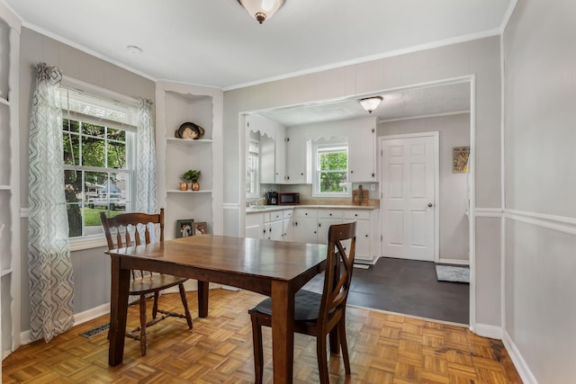 1818 Morningside Ave, Columbia, TN 38401 - dining room featuring baseboards, built in features, and ornamental molding