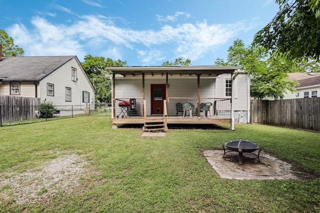 1818 Morningside Ave, Columbia, TN 38401 - back of house with a fire pit and a wooden deck