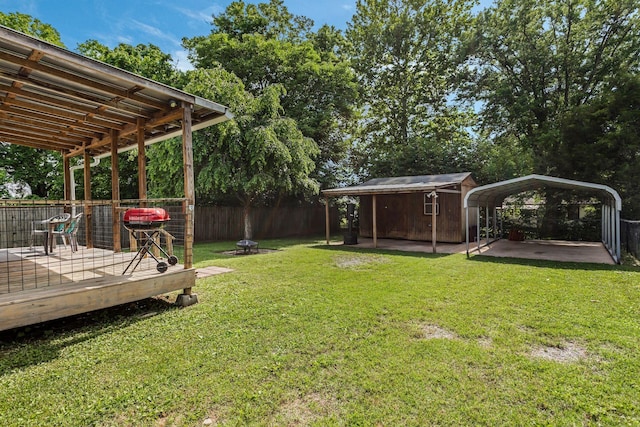 1818 Morningside Ave, Columbia, TN 38401 - view of yard with a wooden deck and a fire pit