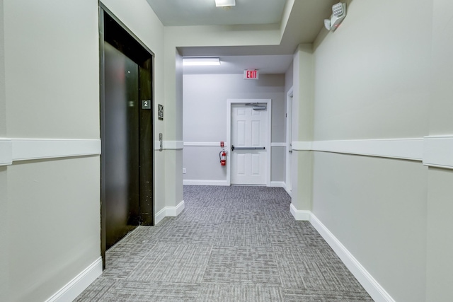 3201 Aspen Grove Dr Unit M4, Franklin, TN 37067 - corridor with carpet flooring, elevator, and baseboards