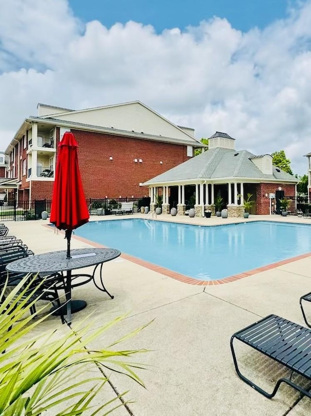 3201 Aspen Grove Dr Unit M4, Franklin, TN 37067 - community pool featuring a patio