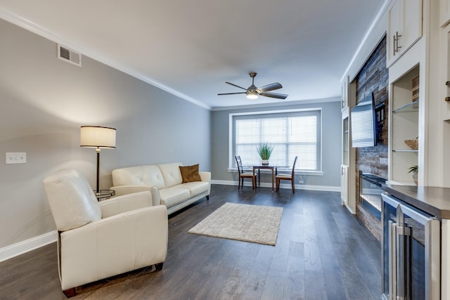 3201 Aspen Grove Dr Unit M4, Franklin, TN 37067 - living area featuring wine cooler, a ceiling fan, crown molding, baseboards, and dark wood finished floors