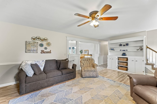 4312 Seminary Rd, Smyrna, TN 37167 - living area featuring a ceiling fan, light wood-style floors, stairs, and baseboards