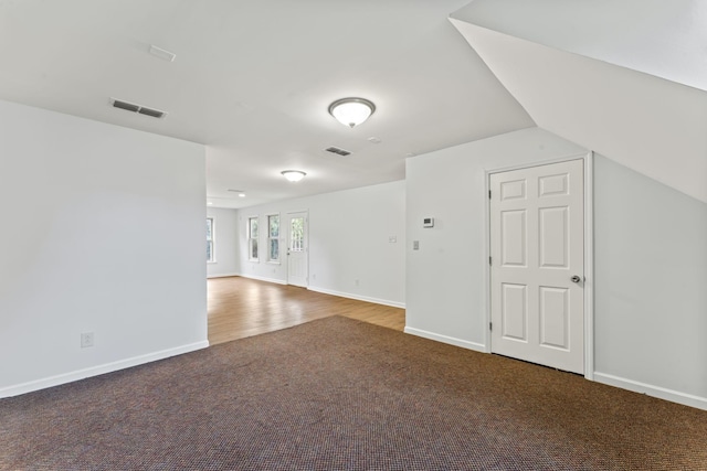 4312 Seminary Rd, Smyrna, TN 37167 - carpeted empty room with baseboards, lofted ceiling, and wood finished floors