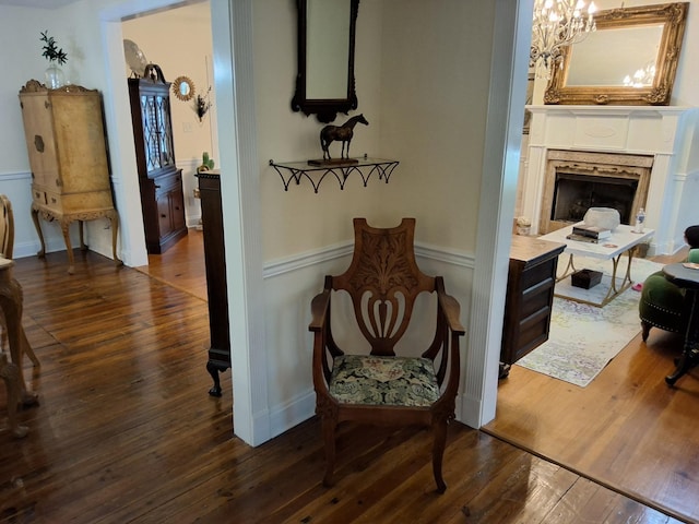 900 Sorghum Hollow Rd, Pulaski, TN 38478 - hallway featuring dark wood-style flooring and a chandelier
