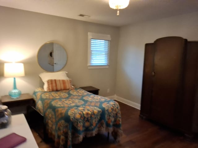 900 Sorghum Hollow Rd, Pulaski, TN 38478 - bedroom featuring wood finished floors and baseboards