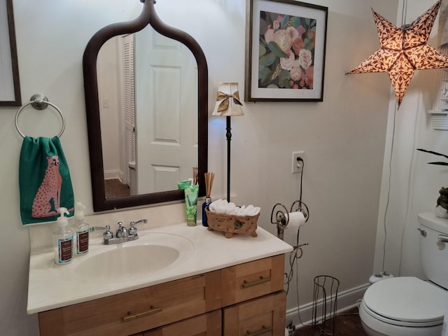900 Sorghum Hollow Rd, Pulaski, TN 38478 - half bath featuring vanity, toilet, and baseboards