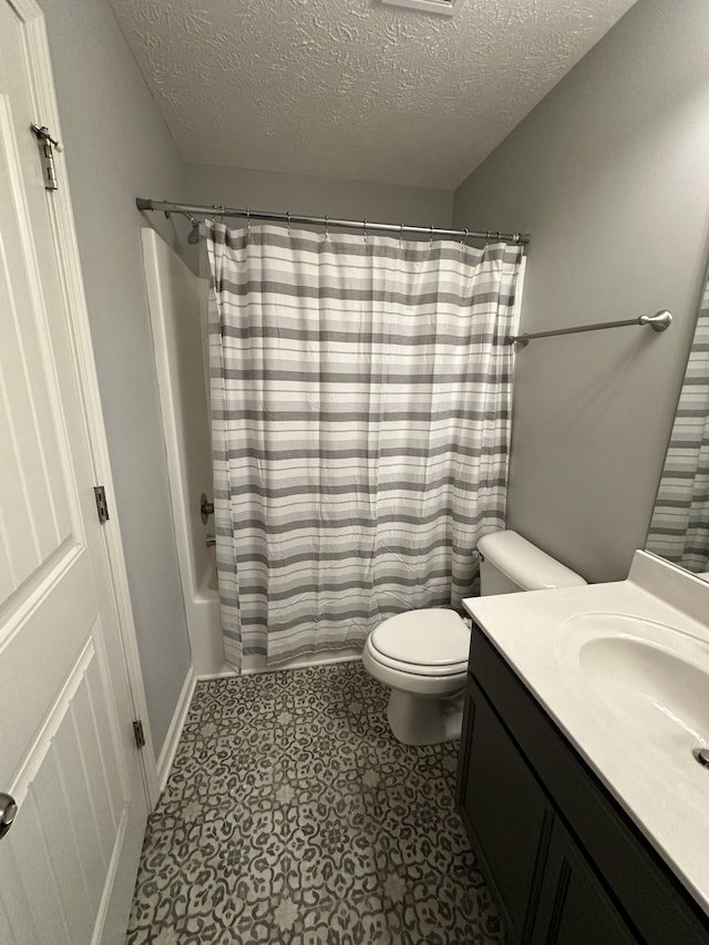 1158 Tradition Trl, Murfreesboro, TN 37130 - bathroom featuring a textured ceiling, vanity, toilet, and shower / tub combo with curtain